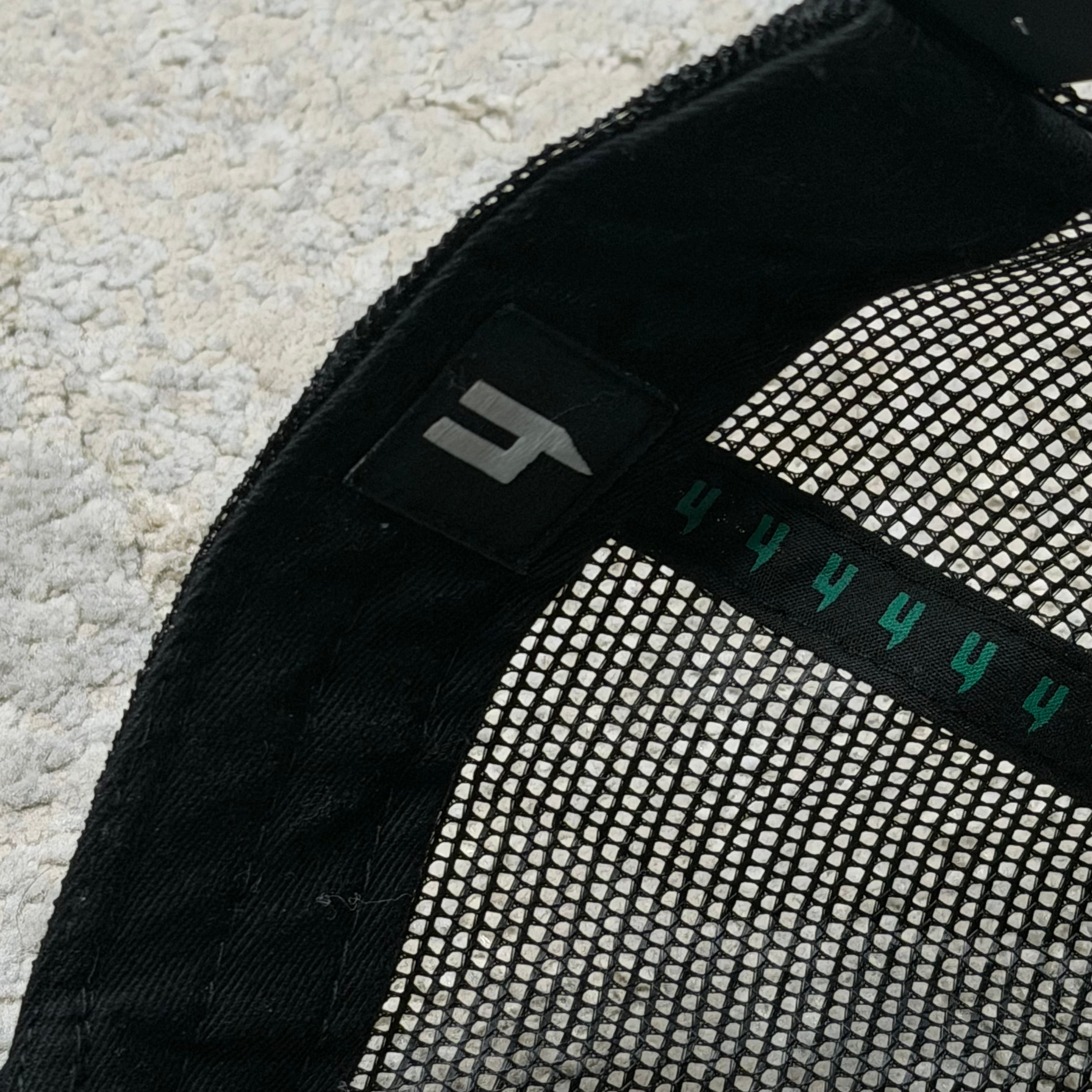 YELIR World Black/Green Trucker Hat